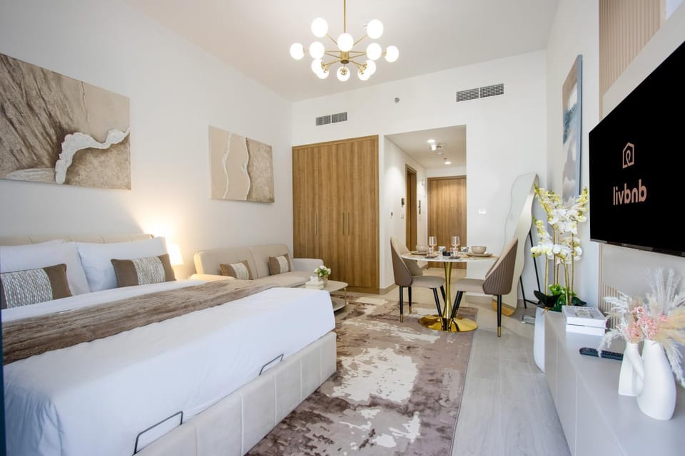 Bed, TV and multimedia, Living room, Seating area, wardrobe