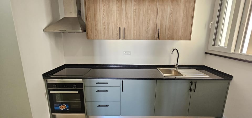 Kitchen or kitchenette, stove