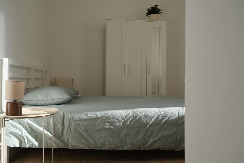 Bed, wardrobe