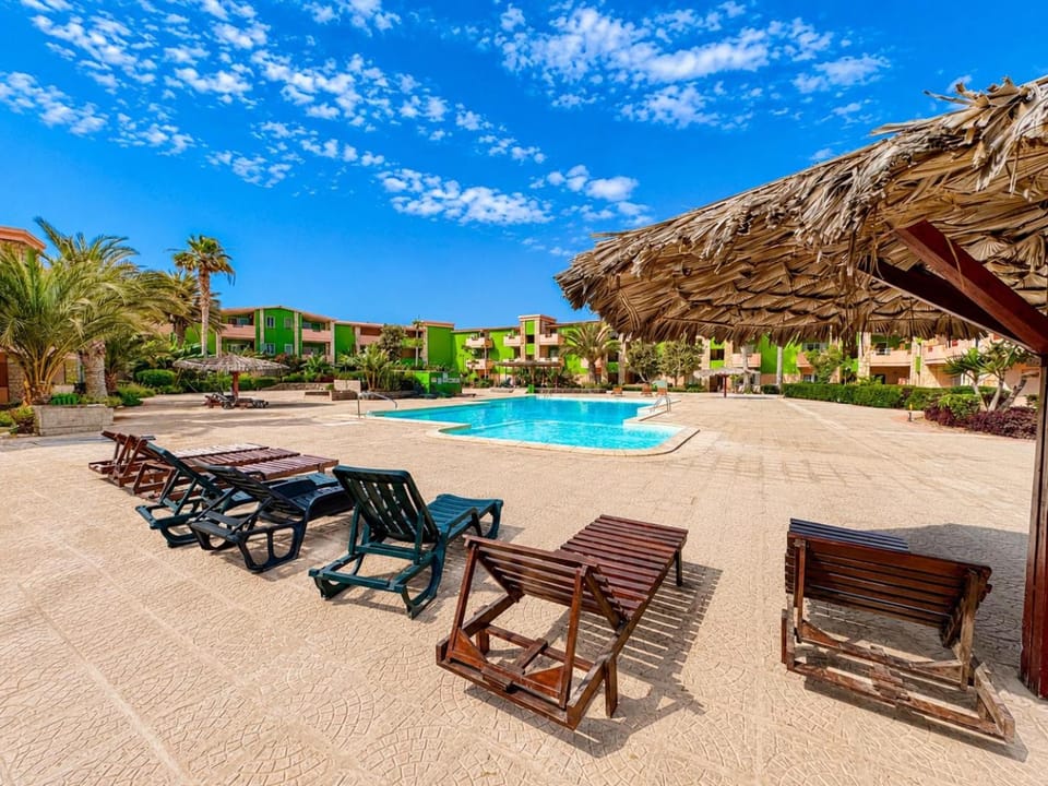 Swimming pool, sunbed