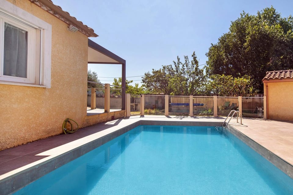 Property building, Living room, Swimming pool