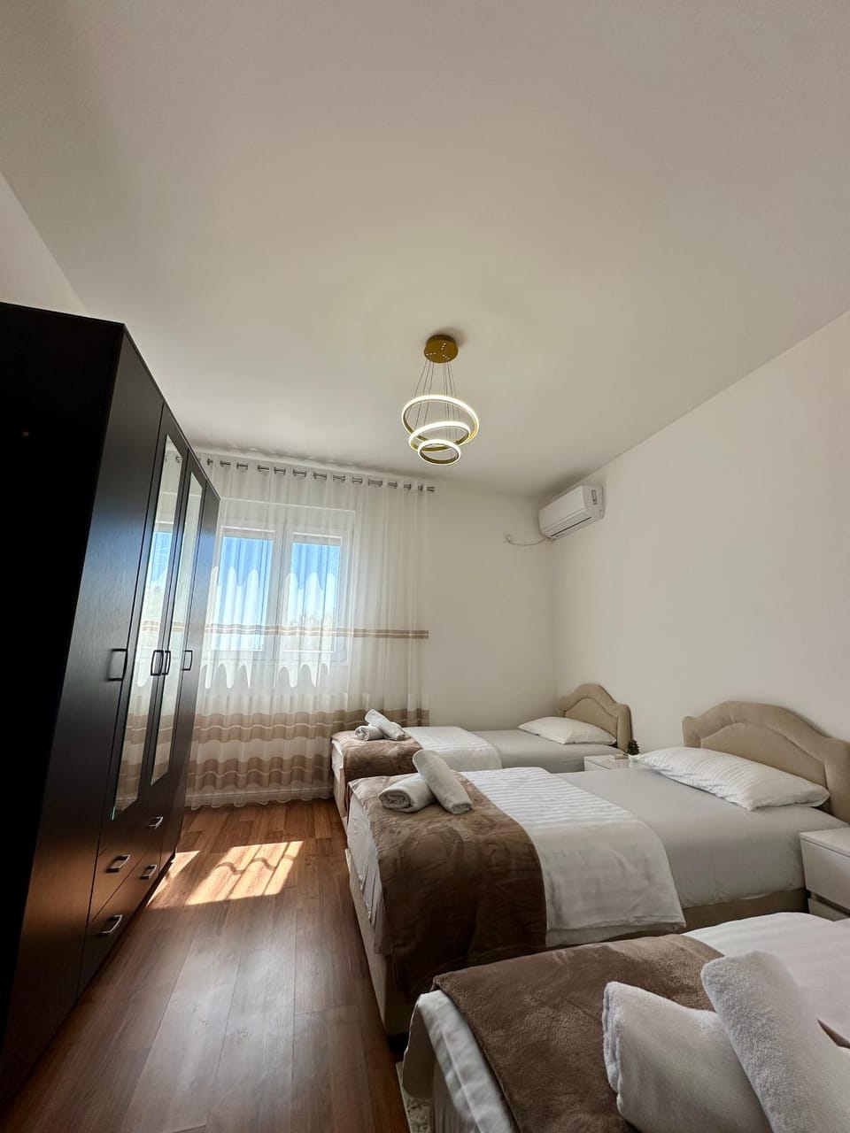 Bed, Bedroom, towels, wardrobe, air conditioner