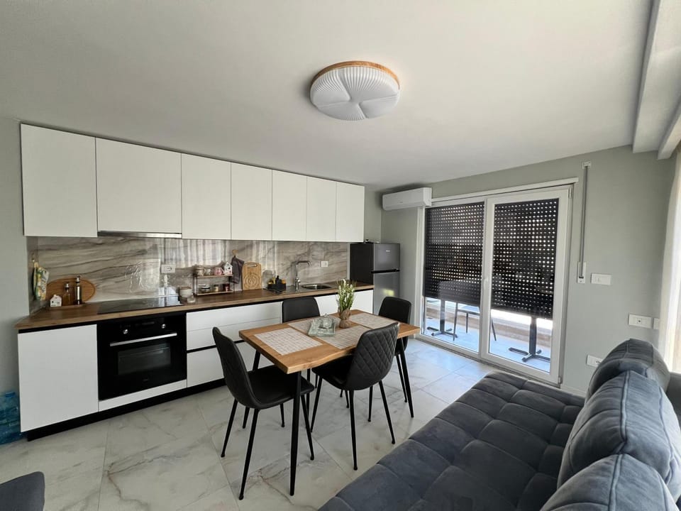 Kitchen or kitchenette, Living room, Seating area, oven, stove