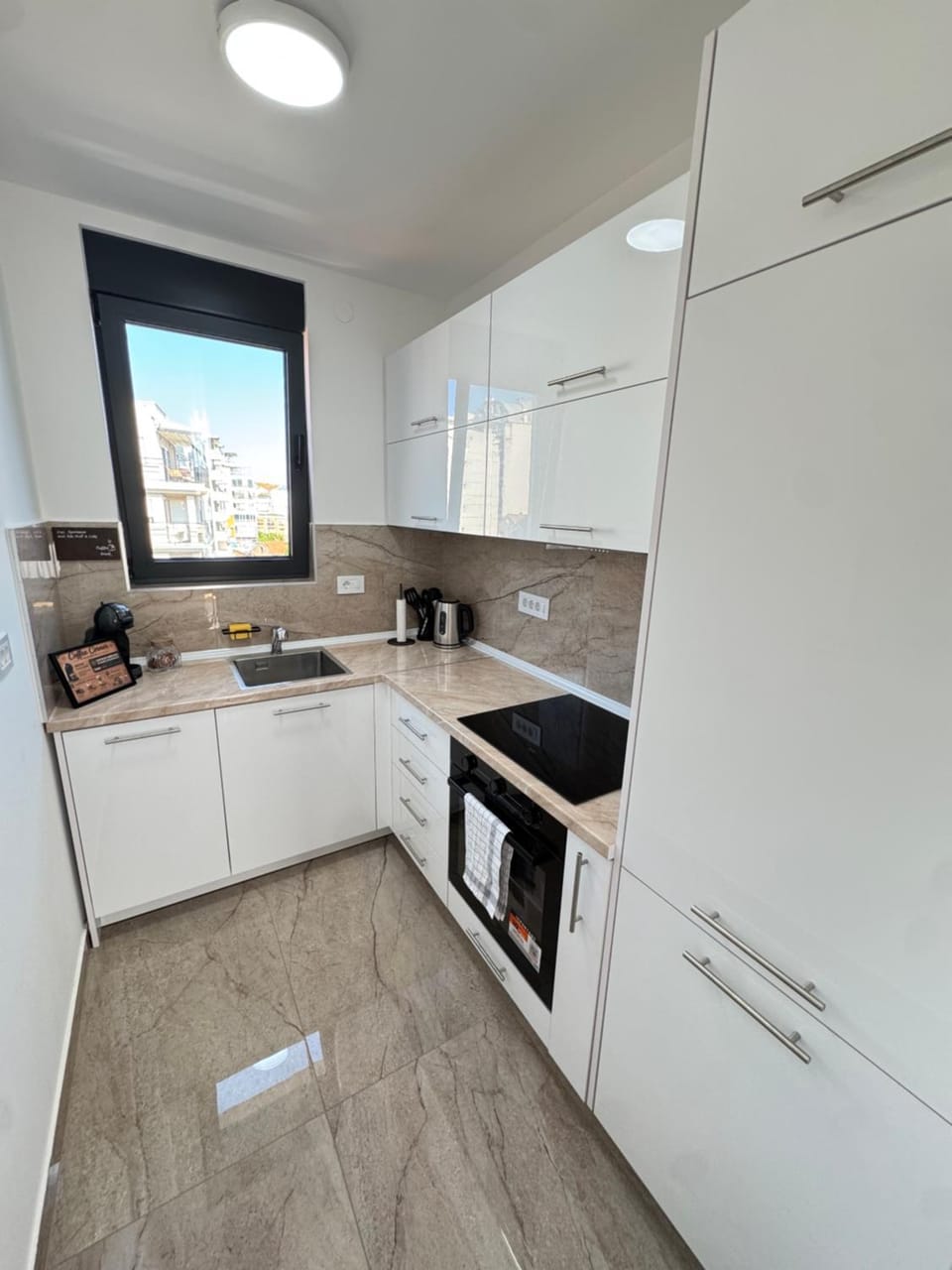 Kitchen or kitchenette, dishwasher, internet, oven, stove