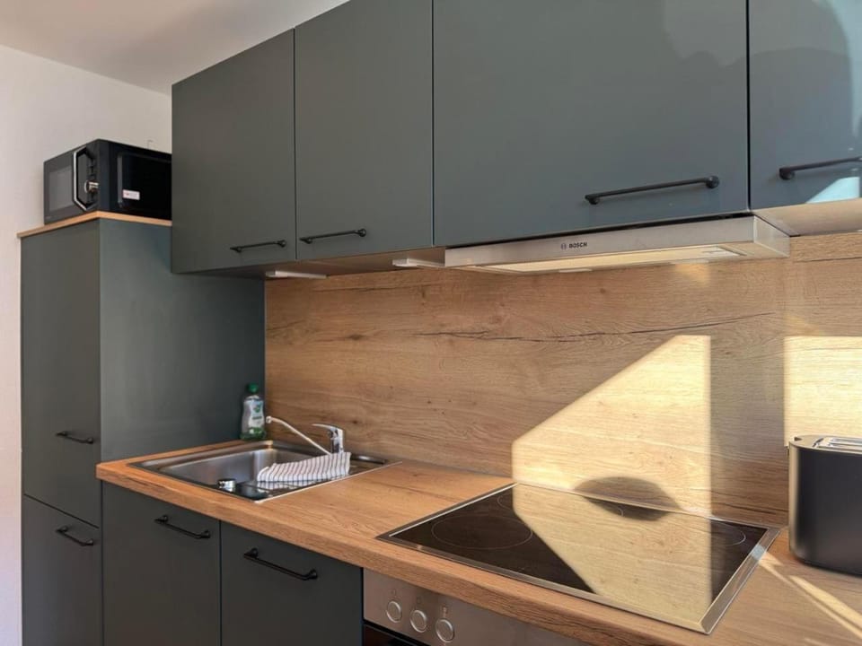 Kitchen or kitchenette, stove