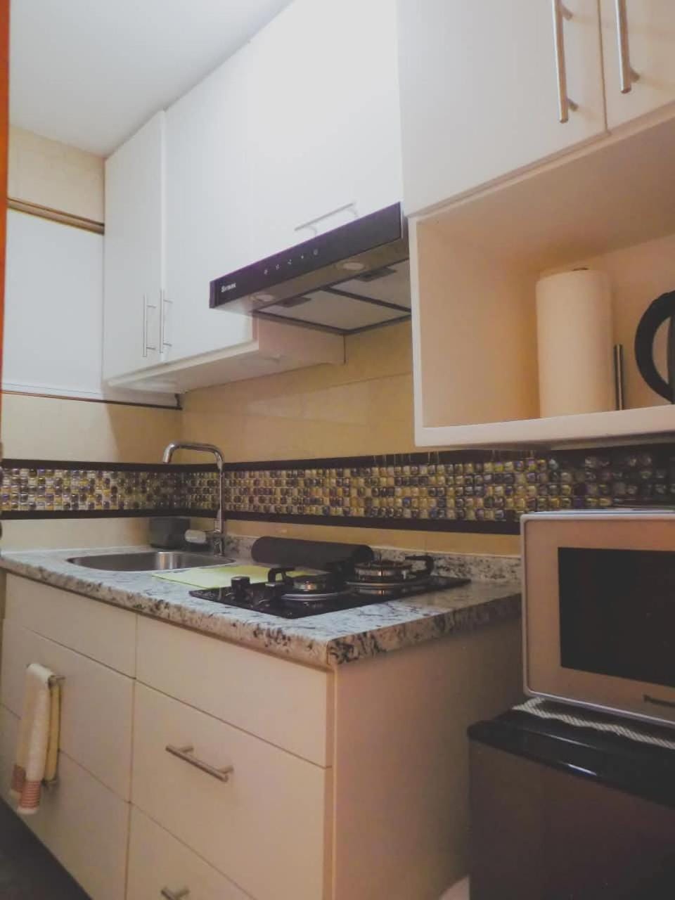 Kitchen or kitchenette, stove