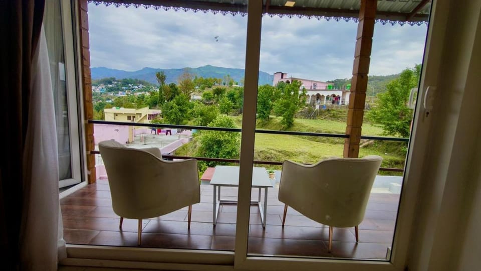 Natural landscape, View (from property/room), Seating area, Mountain view