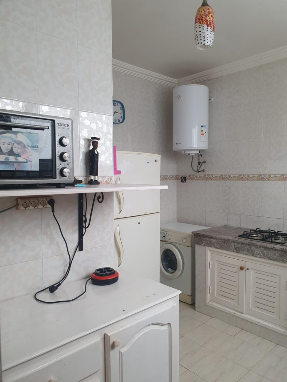 Kitchen or kitchenette, dishwasher, toaster, washing machine