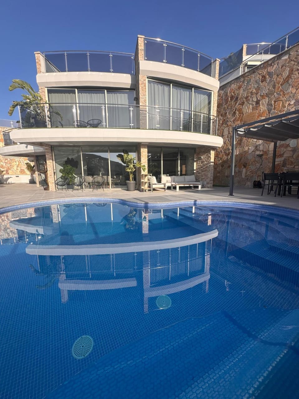 Property building, Living room, Swimming pool