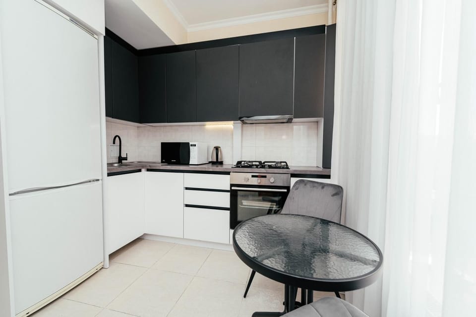 Двухкомнатная квартира с гостиной в центре Кишинёва Apartment in Chișinău