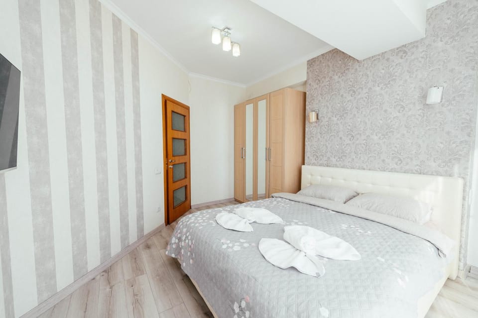 Двухкомнатная квартира с гостиной в центре Кишинёва Apartment in Chișinău