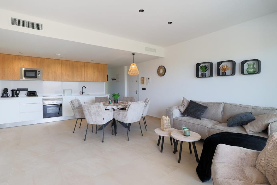 Kitchen or kitchenette, Seating area, Dining area, oven, stove, toaster