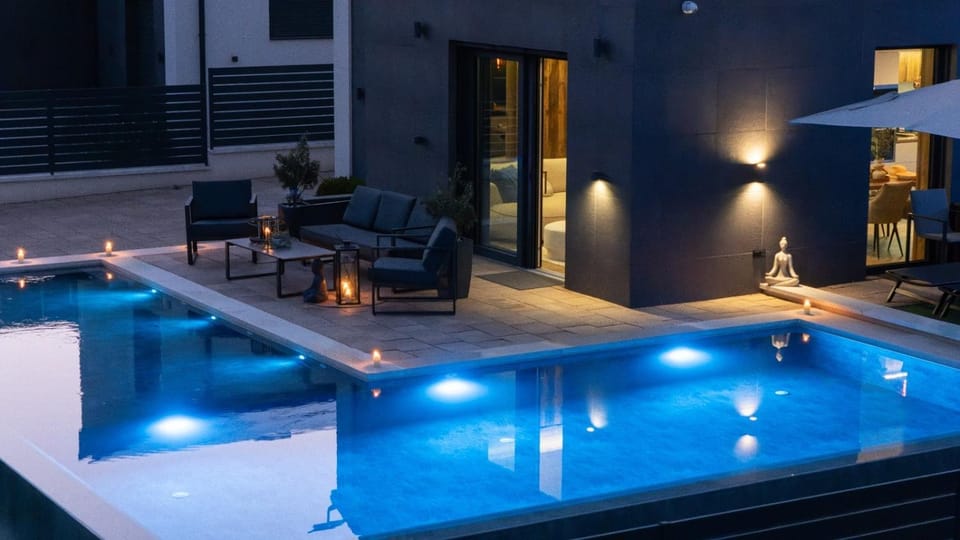 Patio, Night, Pool view, Swimming pool, sunbed