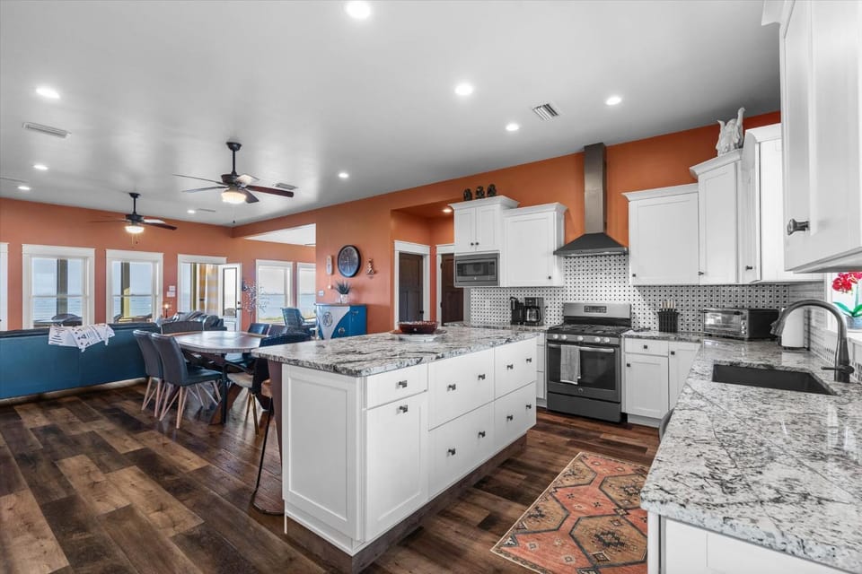 Kitchen or kitchenette, Seating area, Dining area, Sea view, furniture, oven, stove, kitchen