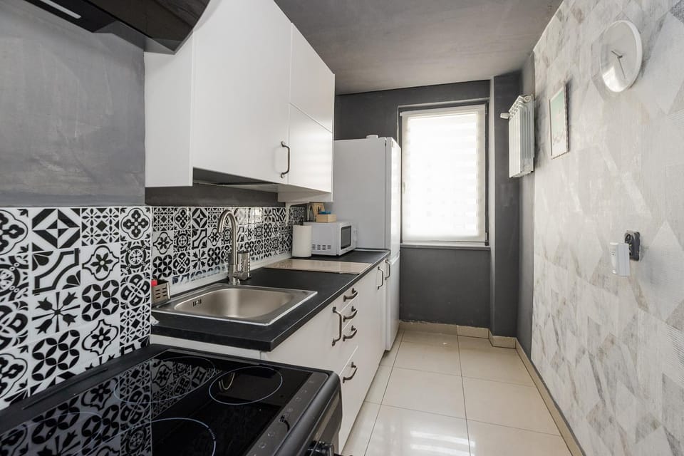 Kitchen or kitchenette, microwave, oven, stove, kitchen