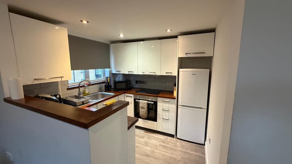 Kitchen or kitchenette, oven, toaster