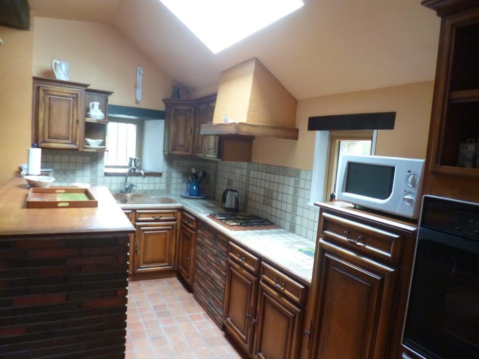 Kitchen or kitchenette, oven, stove, toaster