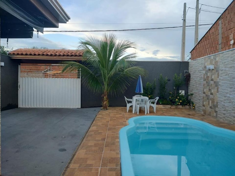 Recanto Mineiro K&R Casa de temporada, Com piscina aquecida, próxima ao Thermas dos Laranjais House in Olímpia