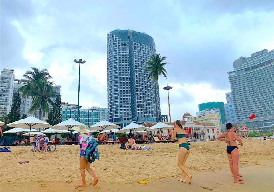 Day, People, Natural landscape, Beach, City view, group of guests