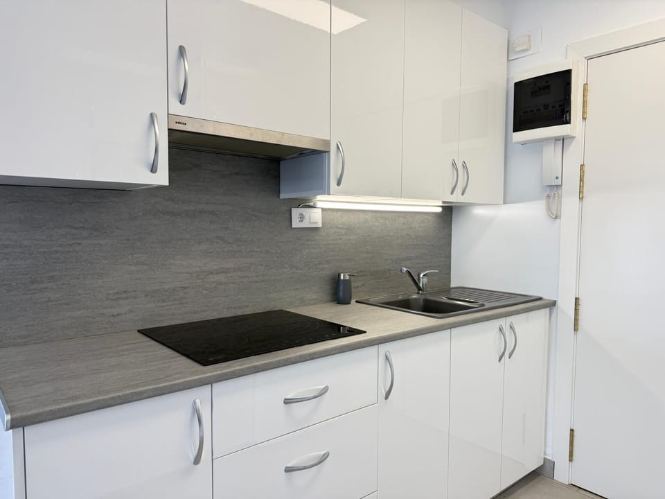 Kitchen or kitchenette, stove