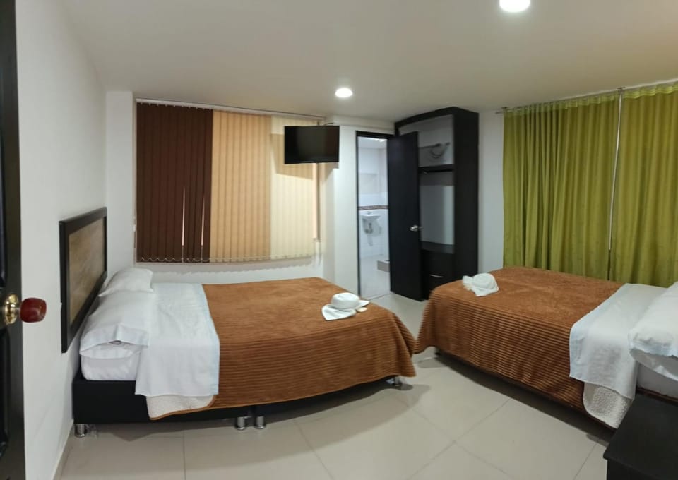 Bed, Photo of the whole room, towels, wardrobe