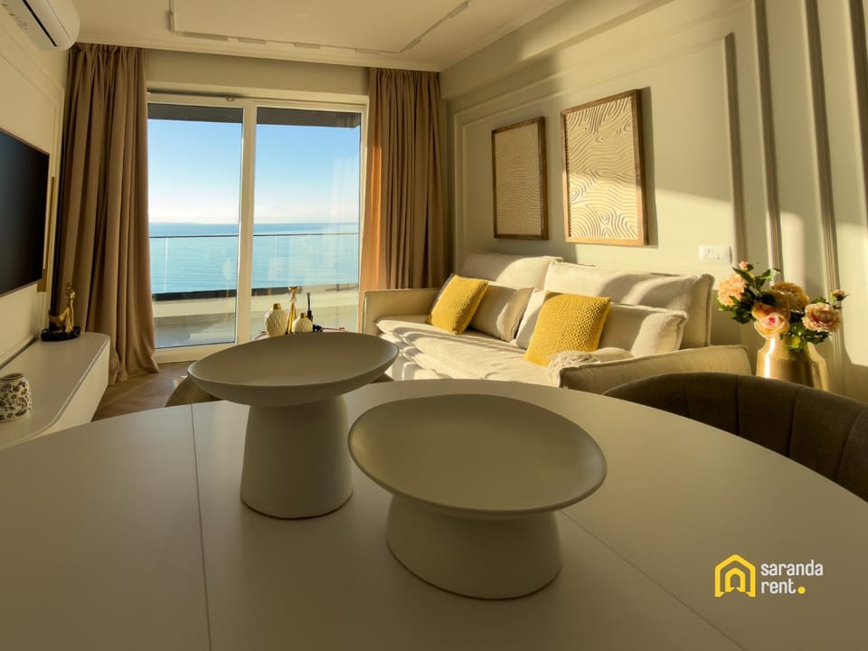 Bed, Living room, Seating area, Sea view