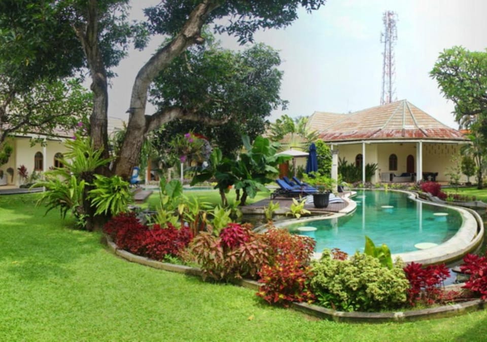 Property building, Day, Natural landscape, Pool view, Swimming pool, sunbed