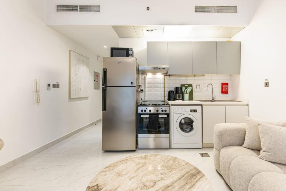 Coffee/tea facilities, Kitchen or kitchenette, Living room, Seating area, oven, pet friendly, stove, toaster, washing machine