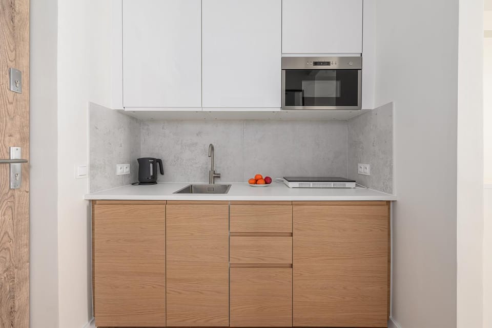 Kitchen or kitchenette, microwave, stove, kitchen
