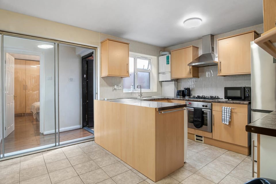 Kitchen or kitchenette, oven, stove