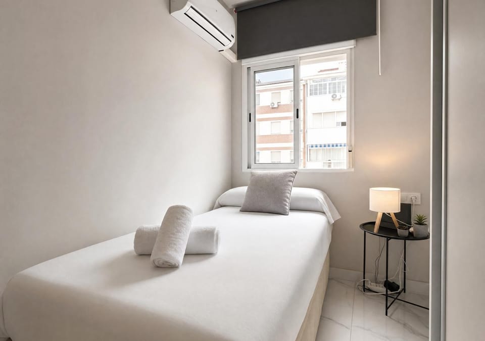 Bed, Photo of the whole room, Bedroom, towels, air conditioner