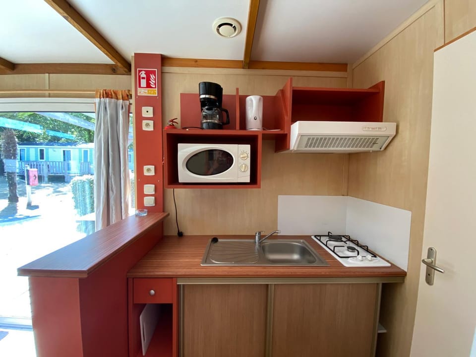 Kitchen or kitchenette, stove, kitchen