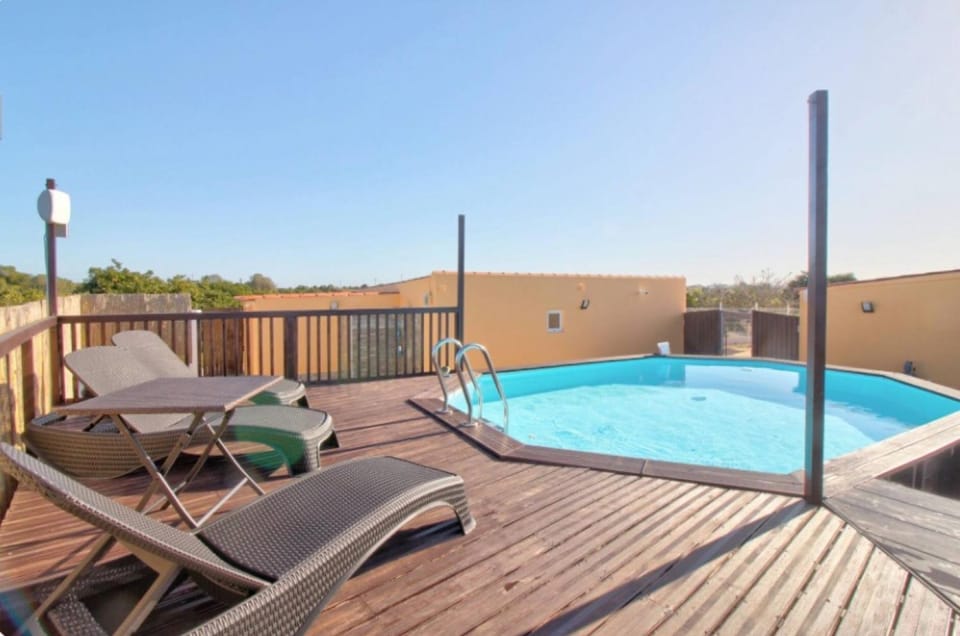 Property building, Living room, Swimming pool
