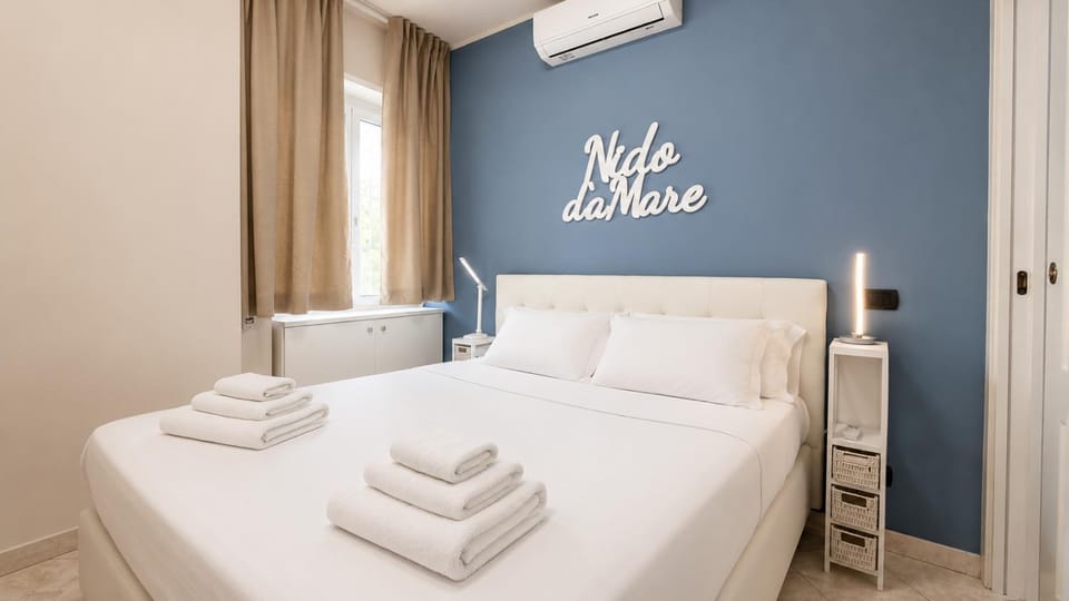 Bed, Photo of the whole room, Bedroom, towels, air conditioner