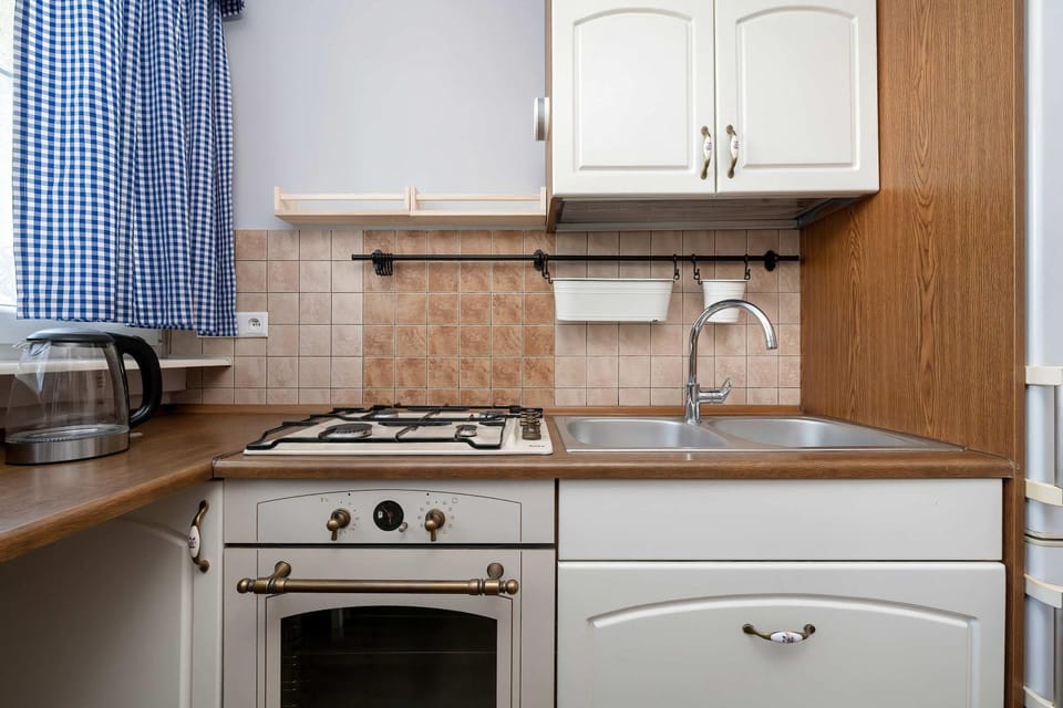 Kitchen or kitchenette, stove