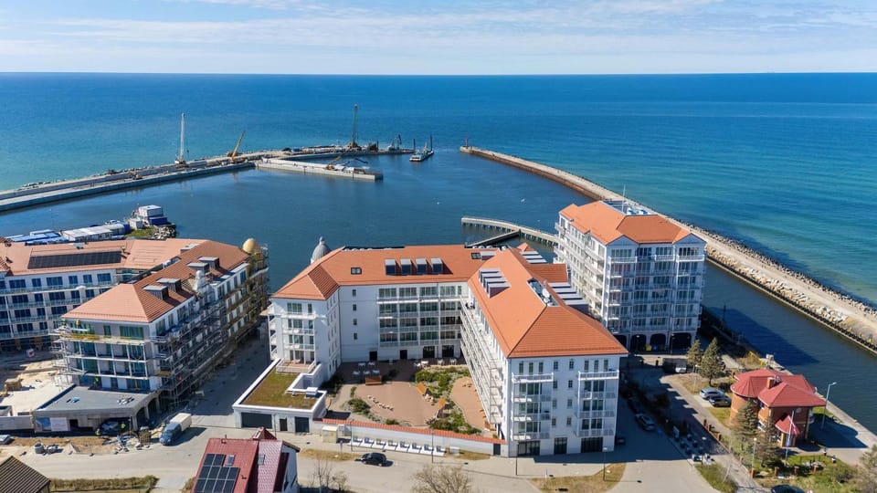 Property building, Day, Beach, Location