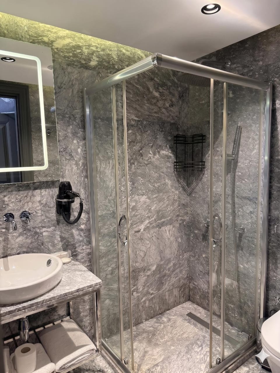 Shower, Toilet, Bathroom, hair dryier, towels