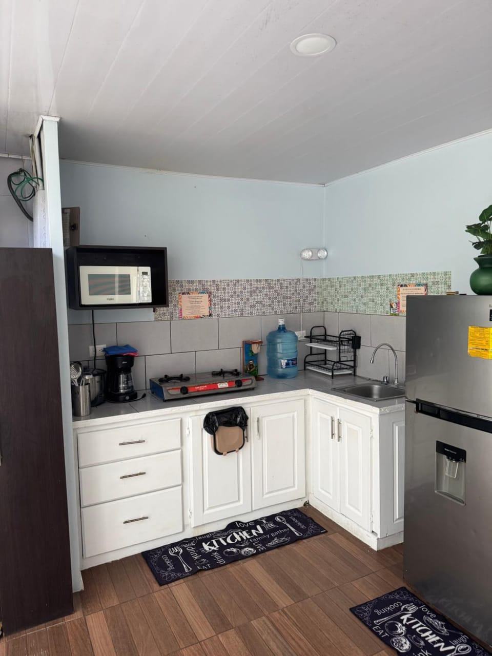 Kitchen or kitchenette, stove, toaster