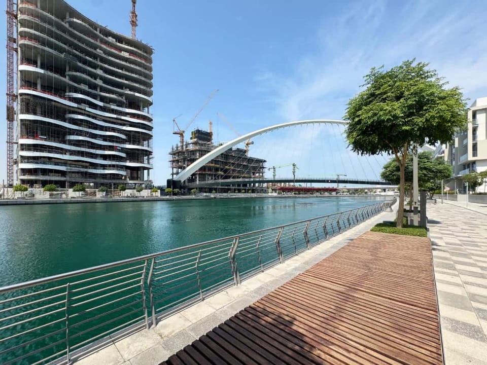 Elegant 2BR Maid Room Canal Front Skyline View Apartment in Dubai