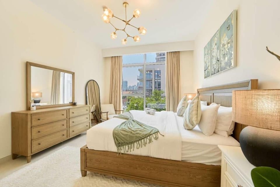 Elegant 2BR Maid Room Canal Front Skyline View Apartment in Dubai
