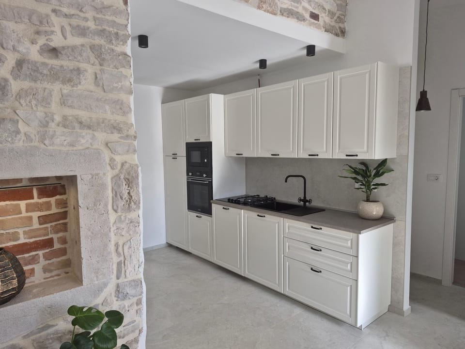 Kitchen or kitchenette, stove