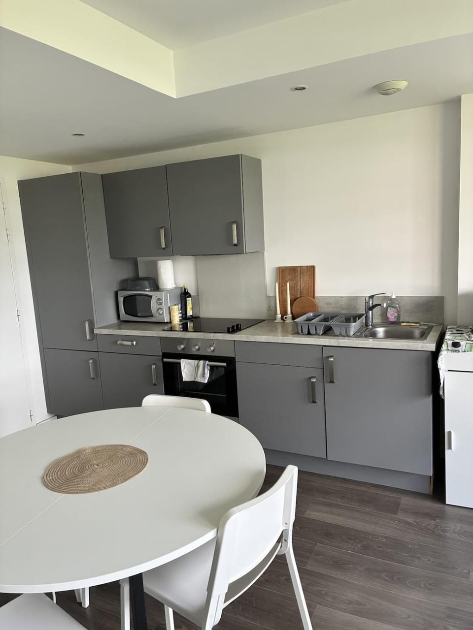 Dining area, microwave, oven, stove, toaster, kitchen