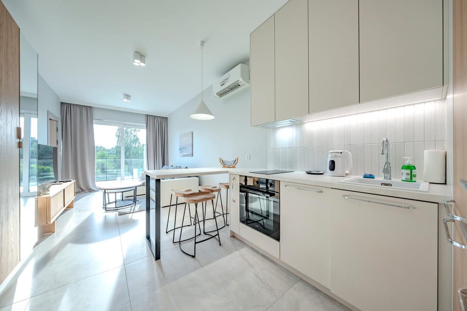 Kitchen or kitchenette, Dining area, stove, air conditioner