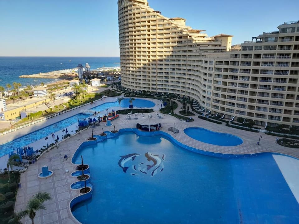 Property building, Day, Natural landscape, Beach, Pool view, Sea view, Swimming pool