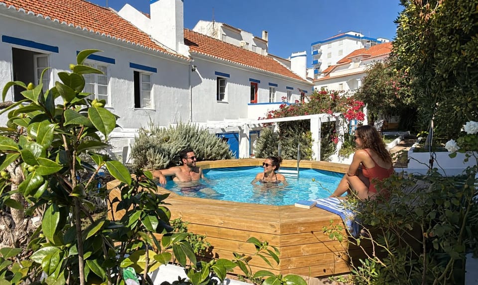 Property building, Pool view, Swimming pool, group of guests