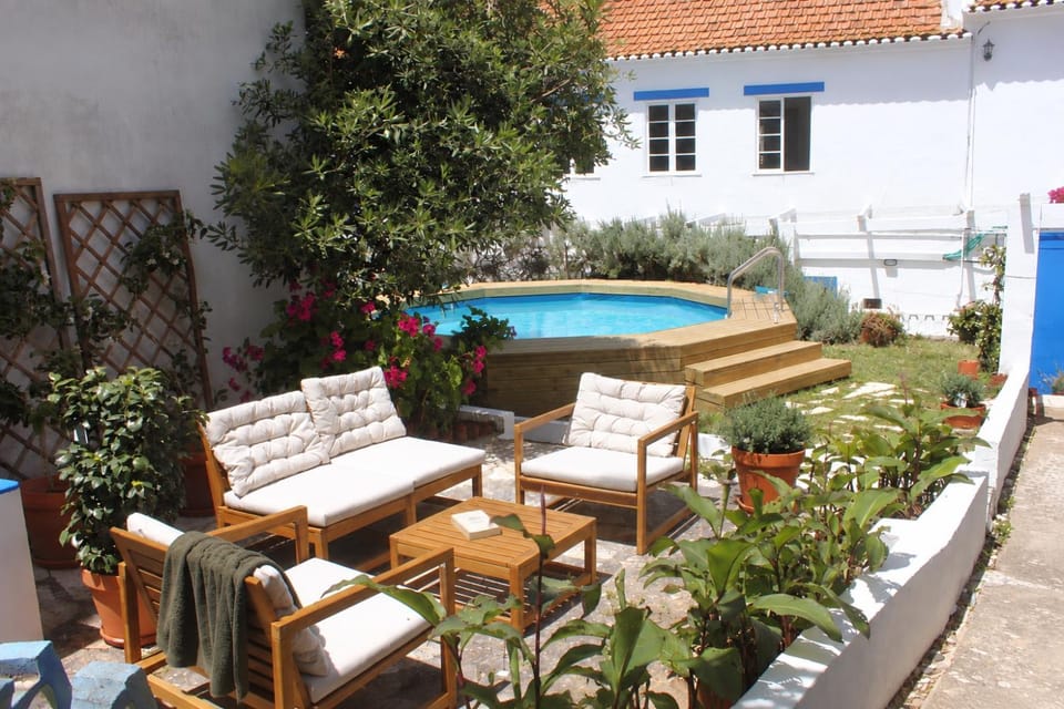 Property building, Patio, Garden, Seating area, Garden view, Pool view, sunbed