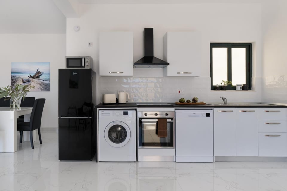 Dining area, stove, washing machine, kitchen