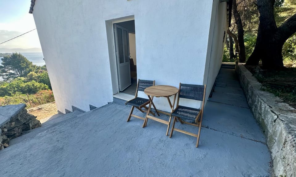 Property building, Patio, Patio, Facade/entrance, Spring, Day, Natural landscape, View (from property/room), Balcony/Terrace, Balcony/Terrace, Seating area, Sea view, Sea view