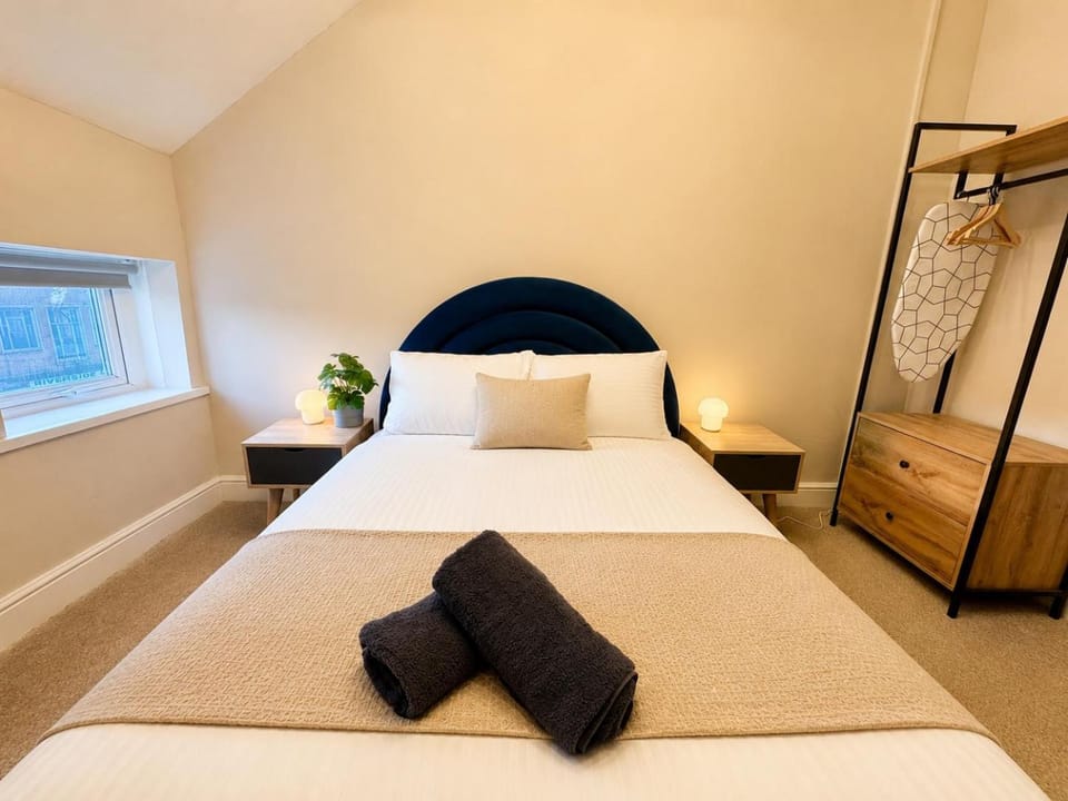 Bed, Bedroom, flat iron, hair dryier, wardrobe