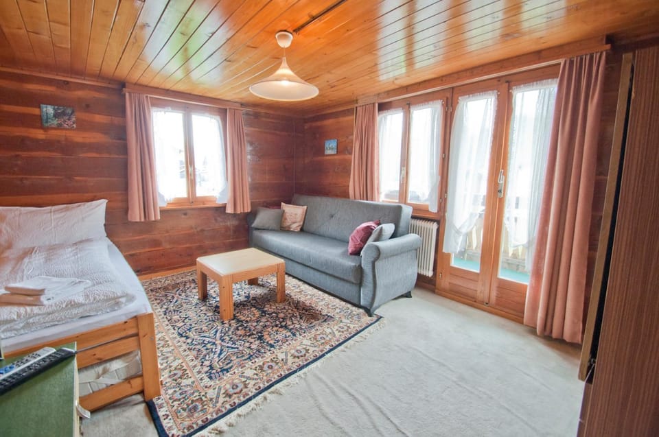 Bed, Living room, Seating area